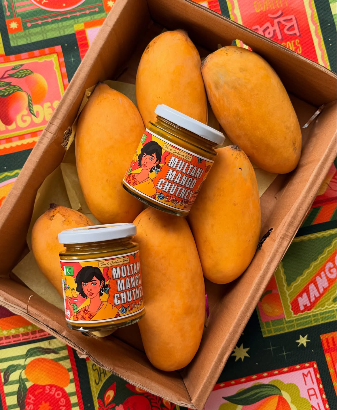 box of Pakistani mangoes and mango chutney