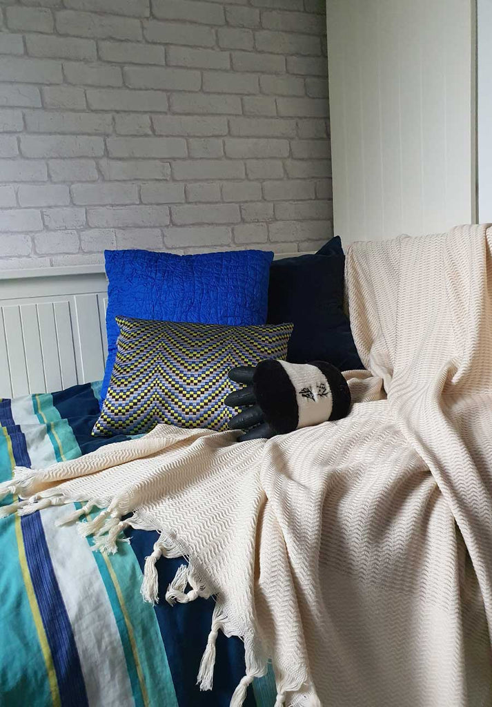 beige throw